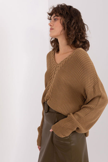 Close-up of Badu's women's V neck sweater, showcasing the intricate variegated texture and soft fabric blend, ideal for comfort and elegance in colder seasons.