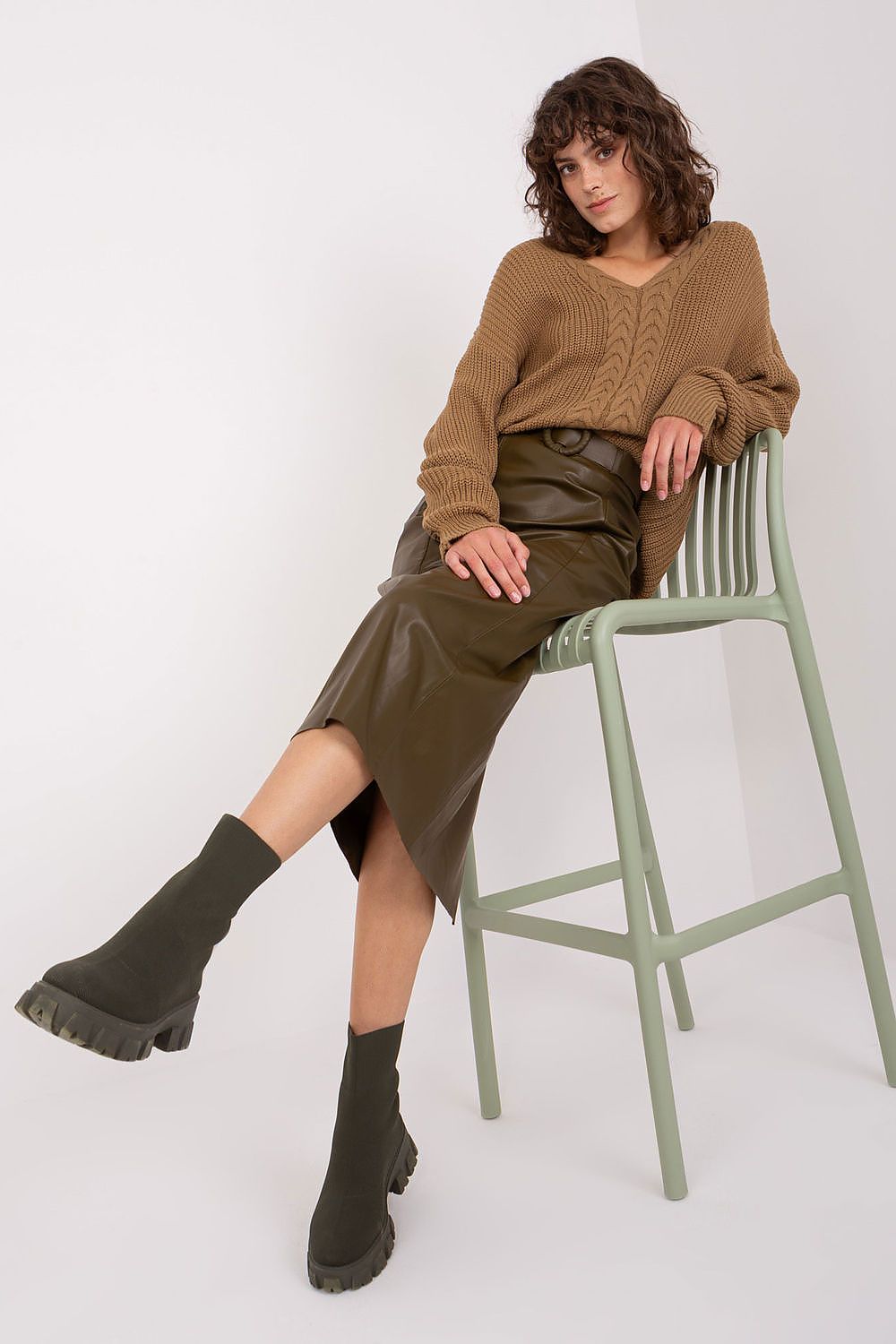 Elegant Women's V Neck Jumper by Badu showcasing a unique variegated texture, crafted from a luxurious acrylic and wool blend, perfect for versatile everyday styling.