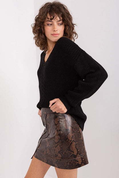 Versatile and elegant women's sweater with long sleeves and variegated texture by Badu, effortlessly adaptable for both work and informal gatherings.