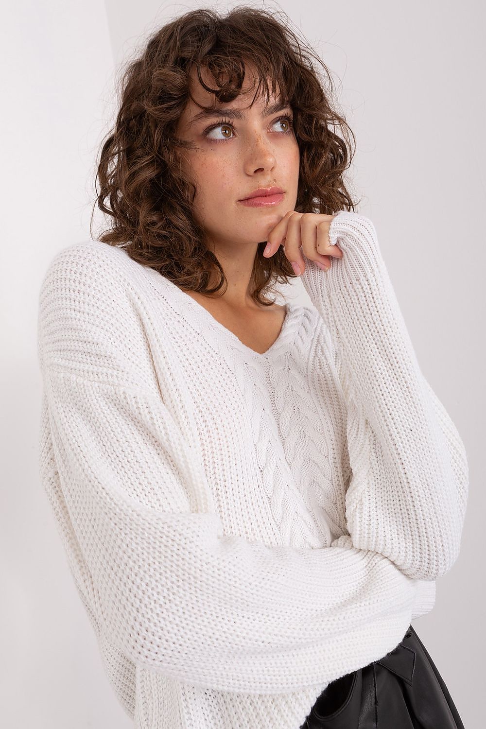Close-up of Badu's Women's Elegant V Neck Sweater, highlighting the unique variegated texture and classic V neckline, perfect for sophisticated everyday wear.