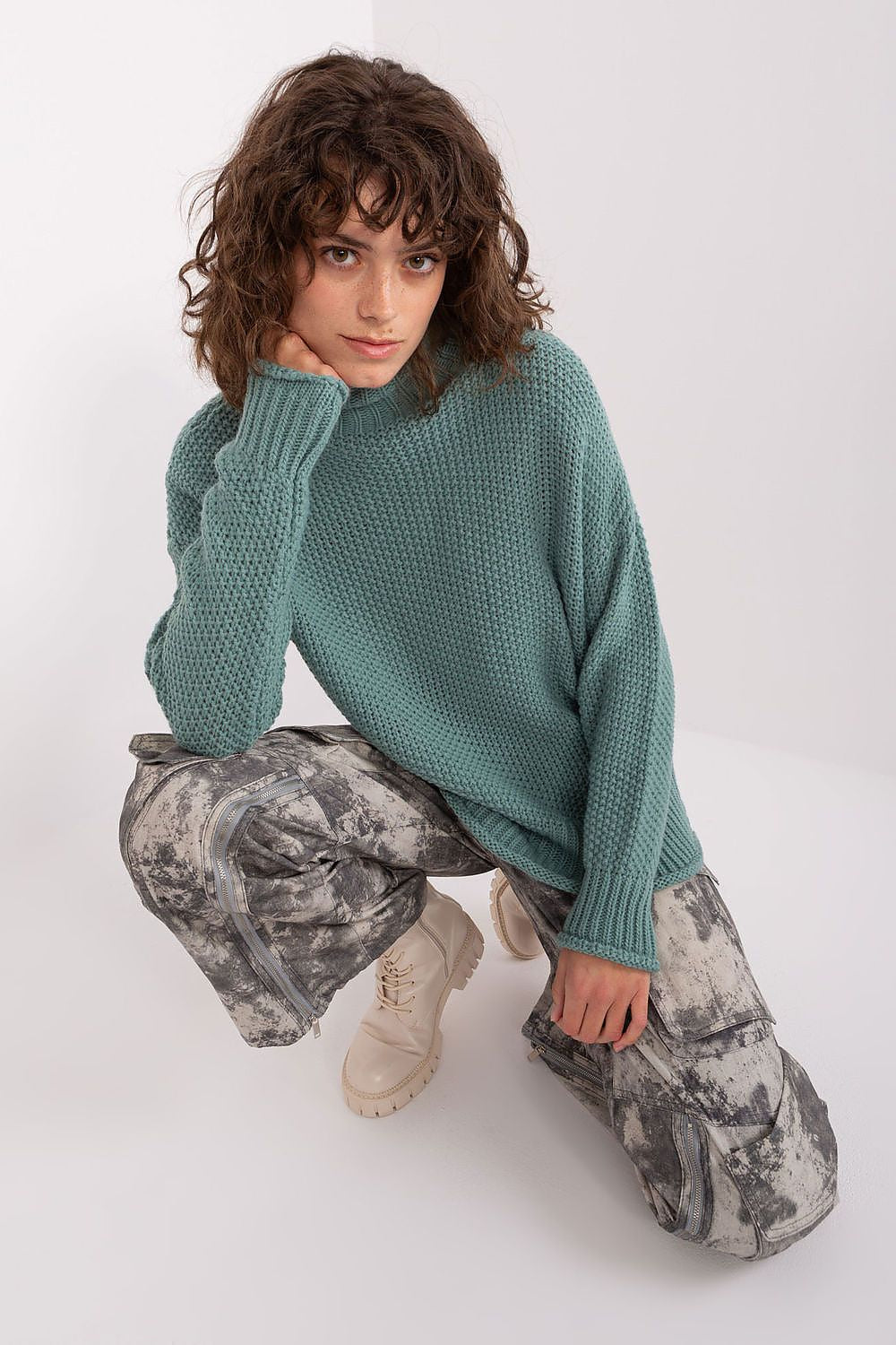 Sophisticated women's turtleneck sweater by Badu, available in timeless colours, ideal for layering and creating stylish combinations.
