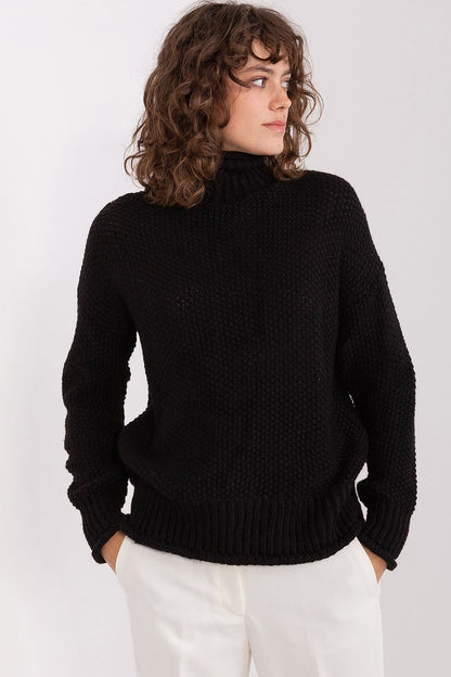 Close-up of Badu's Women's Turtleneck Sweater, highlighting the luxurious soft acrylic and wool blend fabric for ultimate comfort.