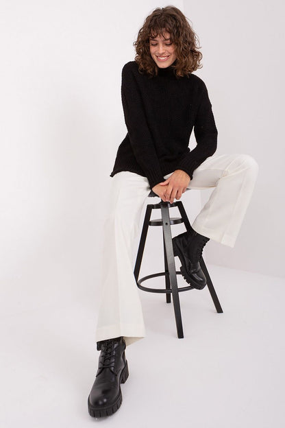 Stylish Women's Turtleneck Sweater by Badu, in a minimalist setting, perfect for casual and professional wear.