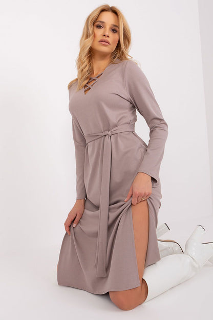 Close-up of decorative lacing on the heart neckline of the Lakerta dress, showcasing luxury and intricate design.