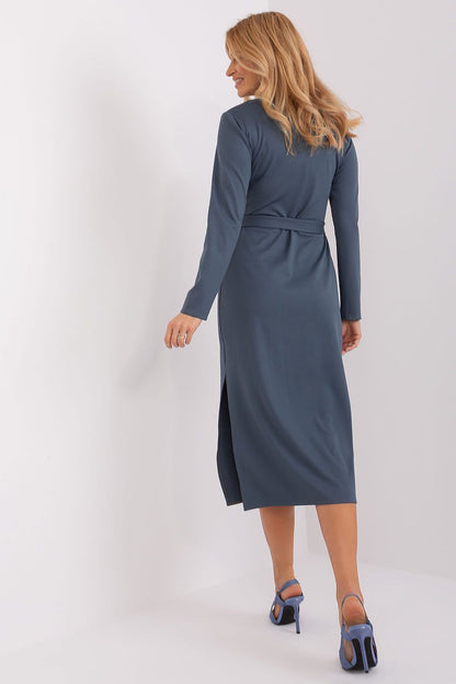 Elegant long sleeve daydress by Lakerta with heart neckline and tie belt, showcasing seductive slits and ribbed fabric.