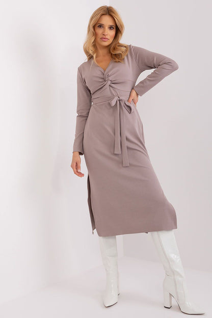 Elegant long sleeve daydress by Lakerta featuring a stylish heart neckline and luxurious design.