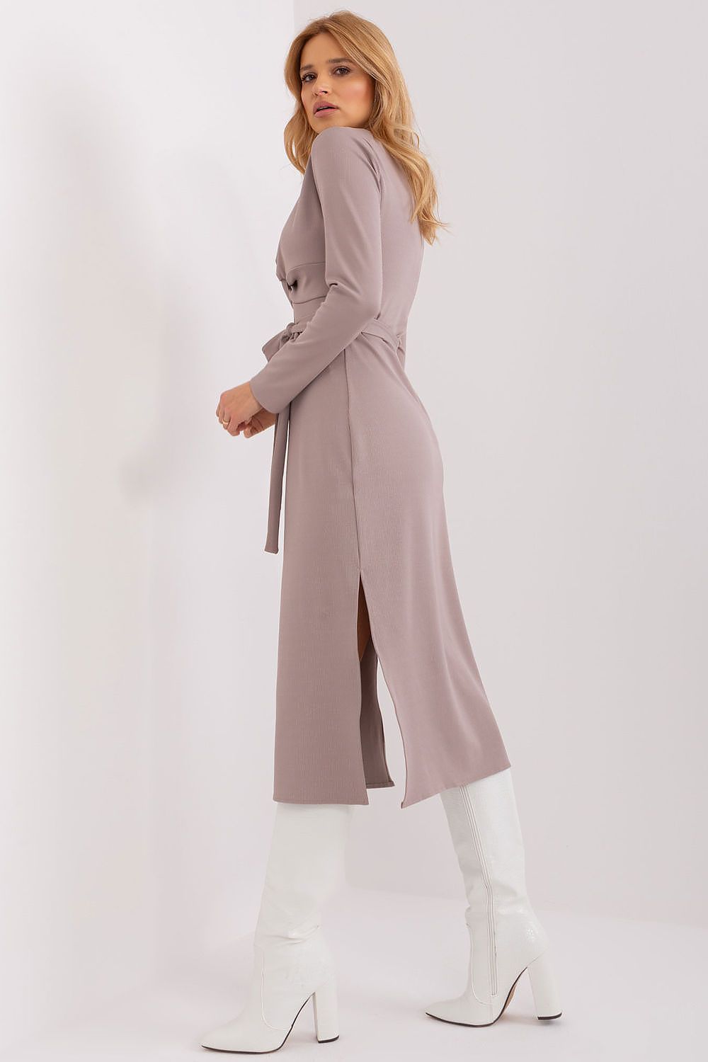 Close-up view of the heart neckline and decorative interlacing on Lakerta's long sleeve daydress.