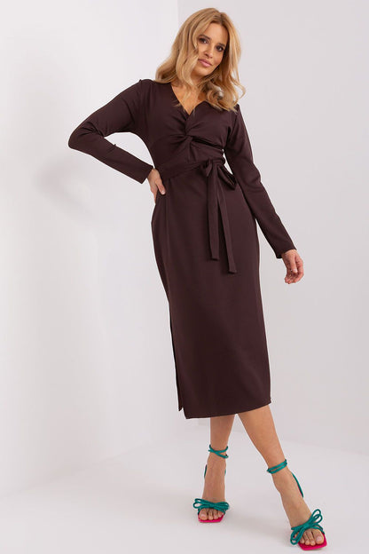 Elegant long sleeve daydress by Lakerta featuring a heart neckline and seductive side slits, crafted from premium ribbed material for a luxurious feel.