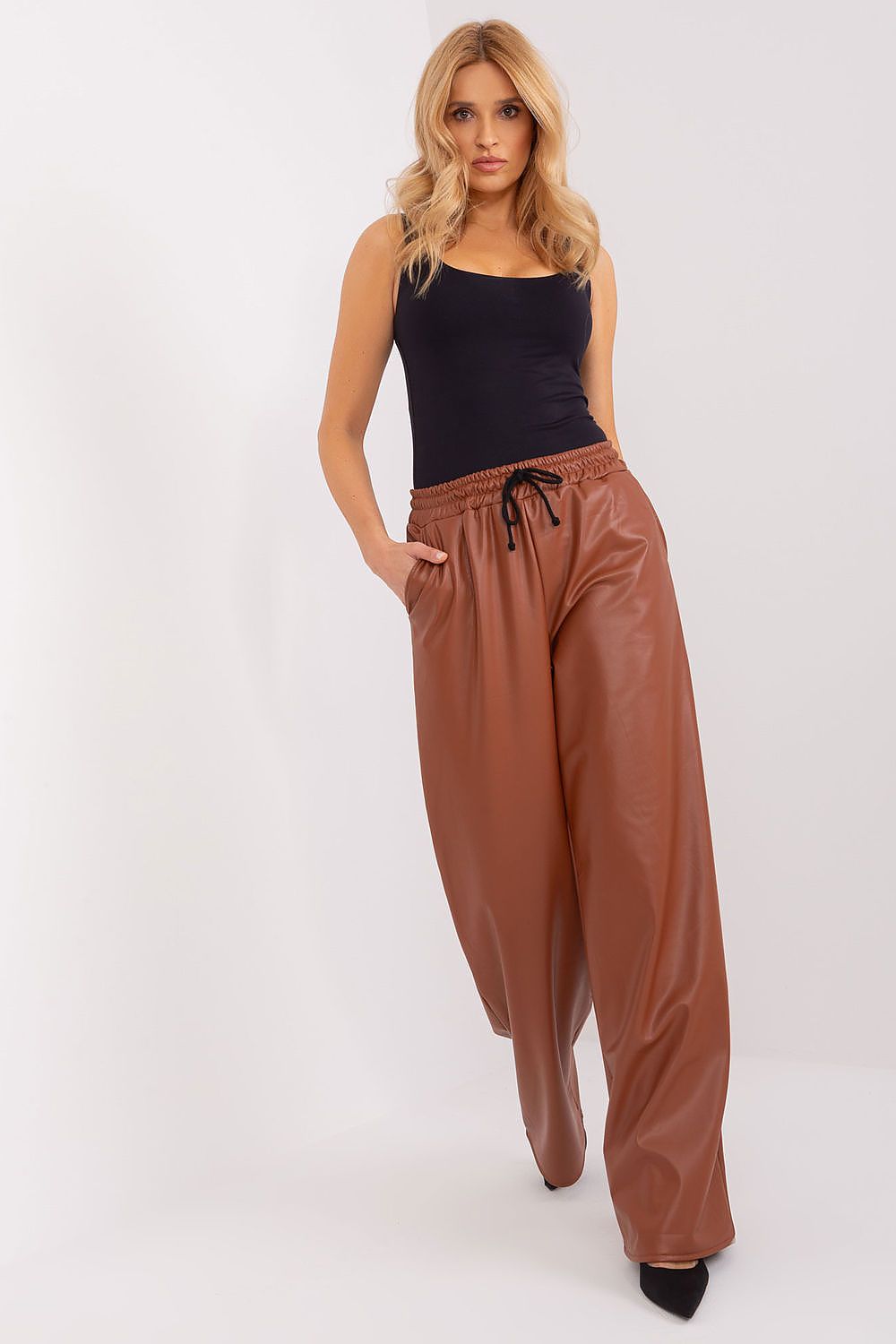 Sophisticated high-waisted trousers by Lakerta, made from ecological leather with a refined insulation feature.
