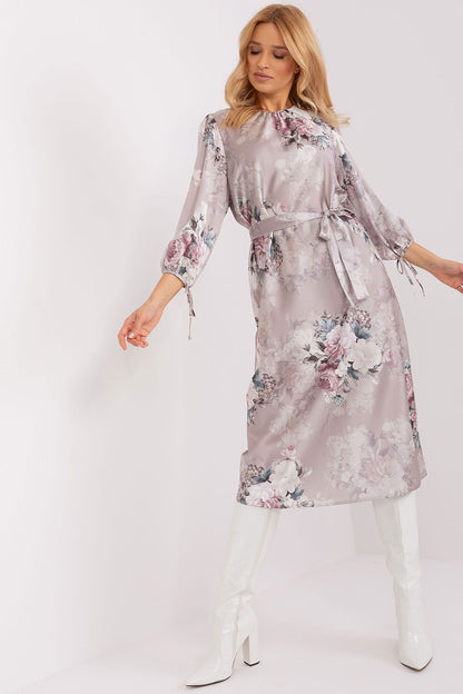 Elegant floral cotton-nylon daydress by Lakerta featuring a straight cut, 3/4 sleeves, and a chic tie belt, perfect for luxury day outings.