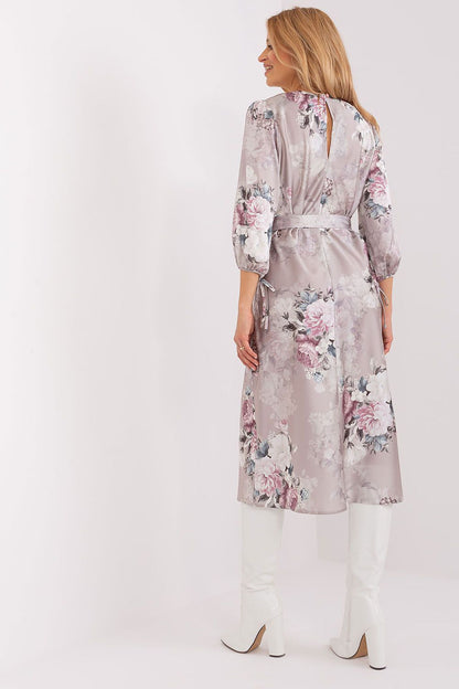 Model wearing the Lakerta elegant floral cotton-nylon daydress with a round neckline and 3/4 sleeves, epitomising luxury and style in daytime fashion.