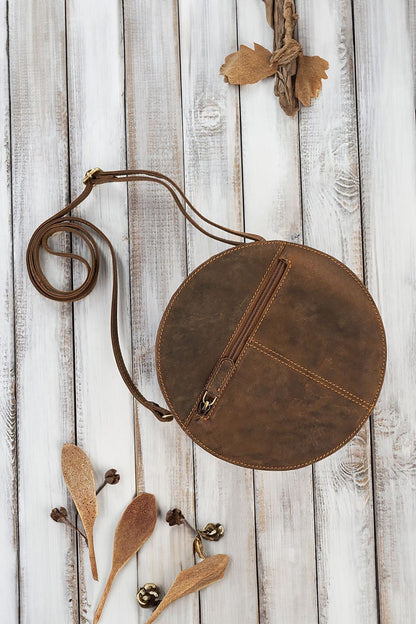 Back view of Galanter Vintage Leather Handbag featuring zippered pocket and adjustable strap for versatile wear.