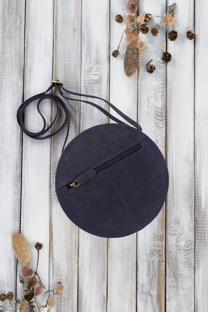 Close-up view of Galanter Aged Natural Leather Women's Handbag showcasing its exquisite craftsmanship, zippered compartments and stylish vintage appeal.