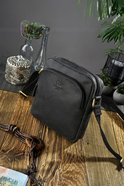 Brown natural leather shoulder bag T-63-HBR by Galanter, showcasing its unique character and luxurious craftsmanship with aged patina.