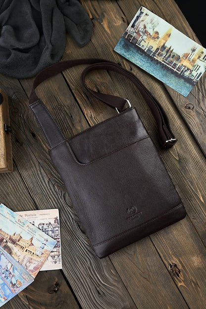 Galanter aged natural leather shoulder bag with adjustable braided strap, showcasing its stylish design and practical features, perfect for everyday elegance.
