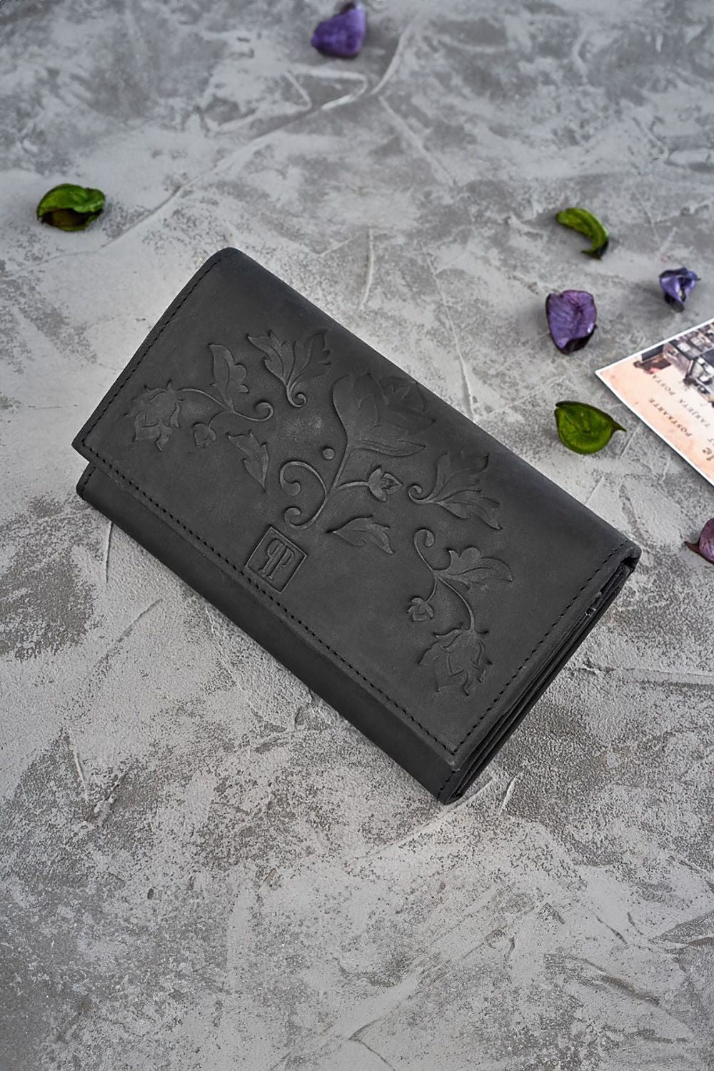 Galanter luxurious women's floral wallet in aged natural leather featuring intricate embossing, showcasing its stylish design and RFID protection.