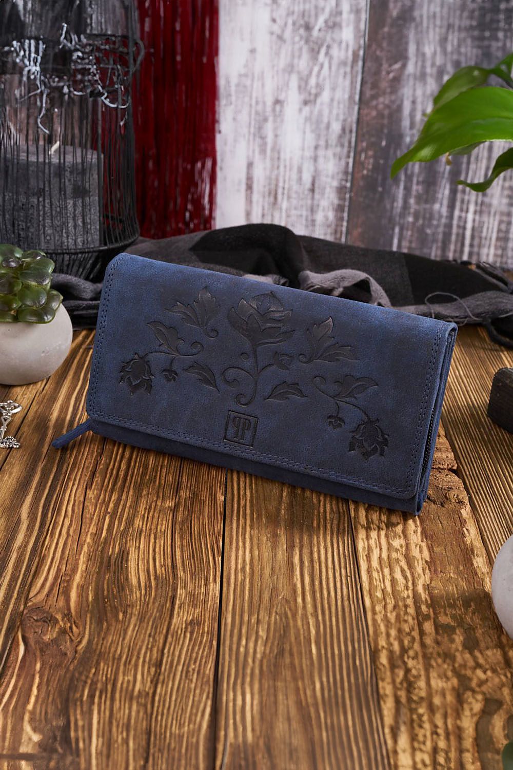 Close-up of Galanter women's vintage wallet T-05-OR, featuring intricate floral embossing and RFID technology for identity protection.