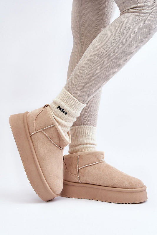 Stylish eco-suede snow boots for women by Step in style, showcasing premium fur insulation and a 4.5cm platform, ideal for trendy and warm winter outfits.