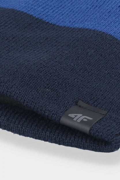 Close-up view of the 4F men's beanie cap showcasing the luxurious texture and branding, designed for comfort and style in colder climates.