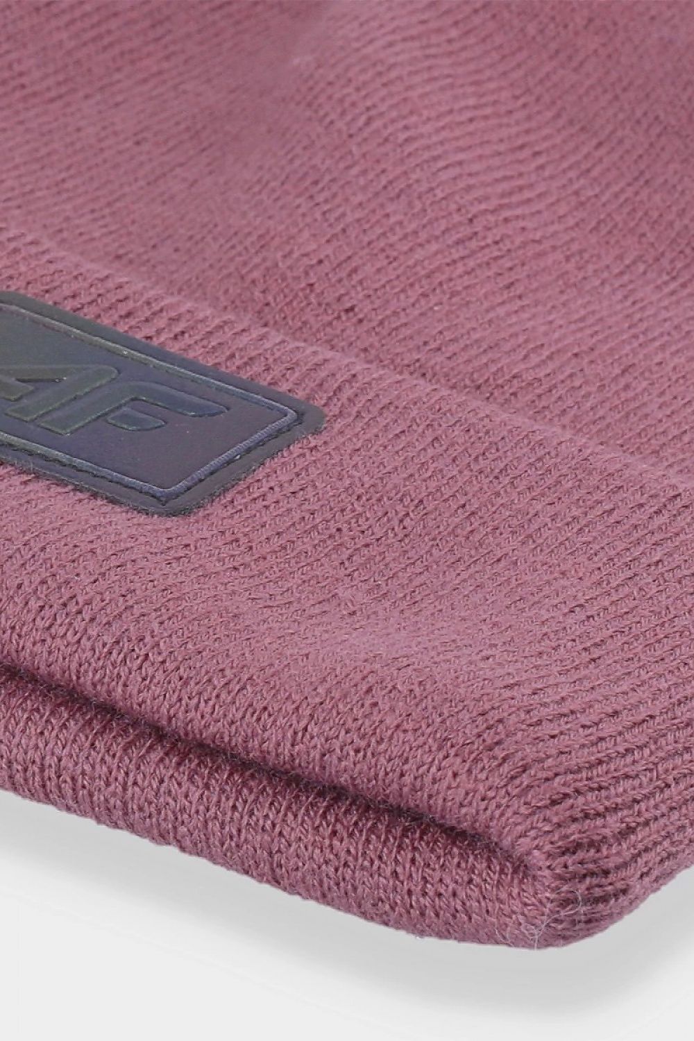 Close-up of 4F Luxury Acrylic Beanie Hat showcasing the rolled cuff detail and logo, reflecting quality craftsmanship.