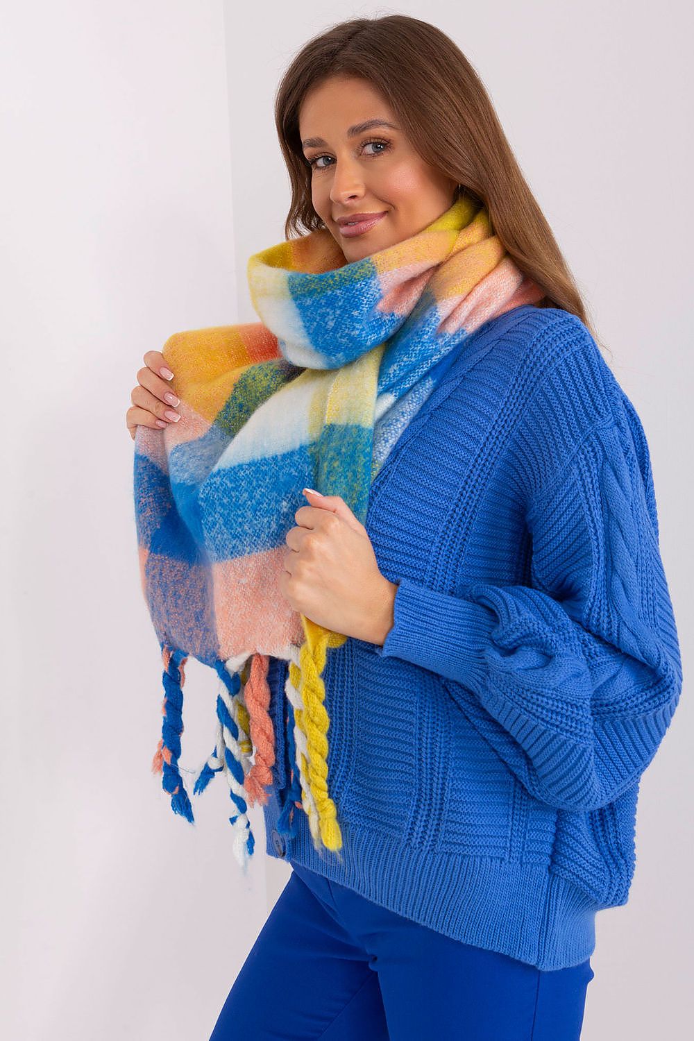 Luxurious colourful plaid long scarf with tassels by AT, exquisitely crafted from 100% durable polyester, ideal for sophisticated fall and winter style.