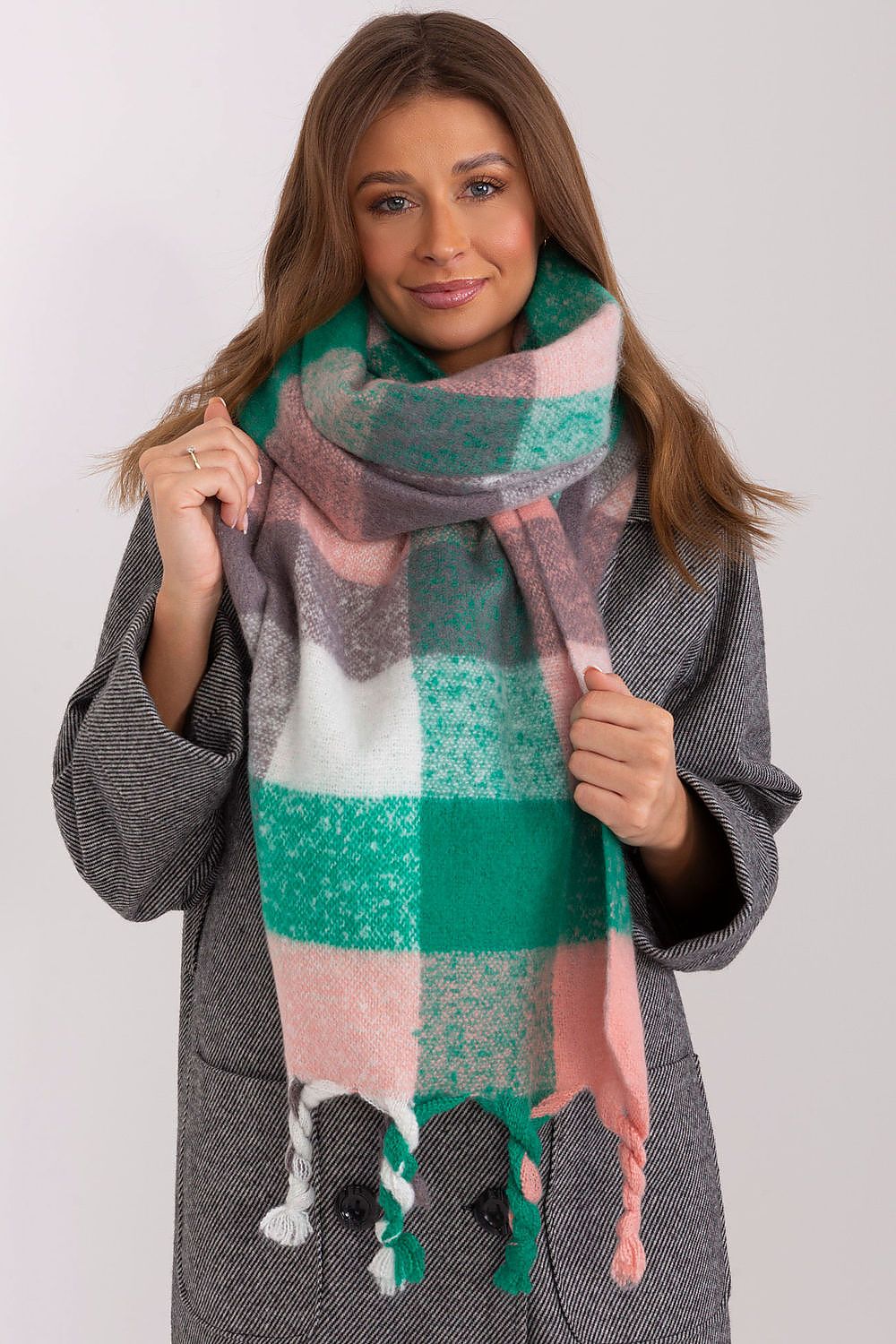 Stylish colourful plaid scarf by AT, made from premium 100% polyester, showcasing versatility for chic autumn and winter looks.