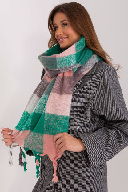 Fashionable long plaid scarf with delicate tassels by AT, designed for comfort and elegance in cooler seasons.