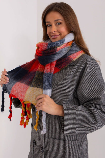 Beautiful long plaid scarf with delicate tassels by AT, designed for a fashionable and cozy fall and winter experience.