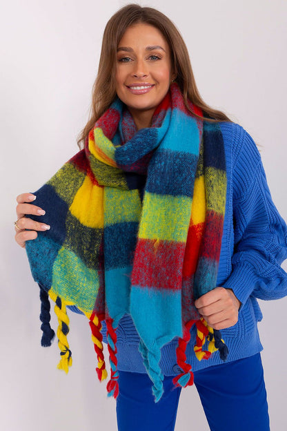 Elegant view of the AT plaid long scarf featuring colourful patterns and tassels, ideal for adding a touch of sophistication to seasonal attire.