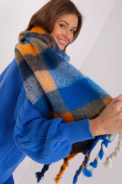 AT luxurious colourful plaid scarf, designed for sophisticated fall and winter fashion, featuring a soft polyester texture and flattering tassels.
