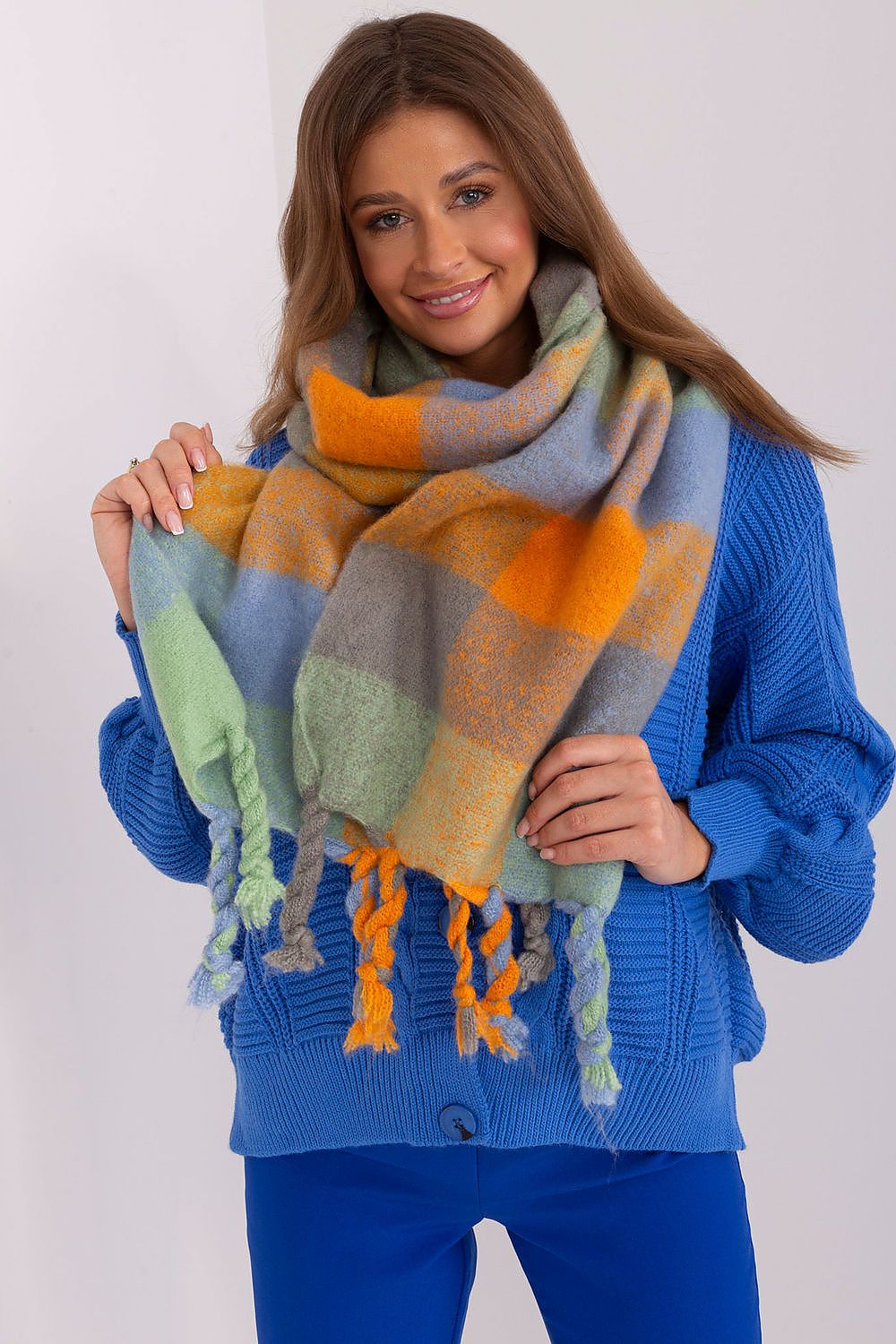 Elegant long scarf by AT in a chic plaid design, crafted from 100% polyester, perfect for adding a touch of luxury to any autumn or winter ensemble.