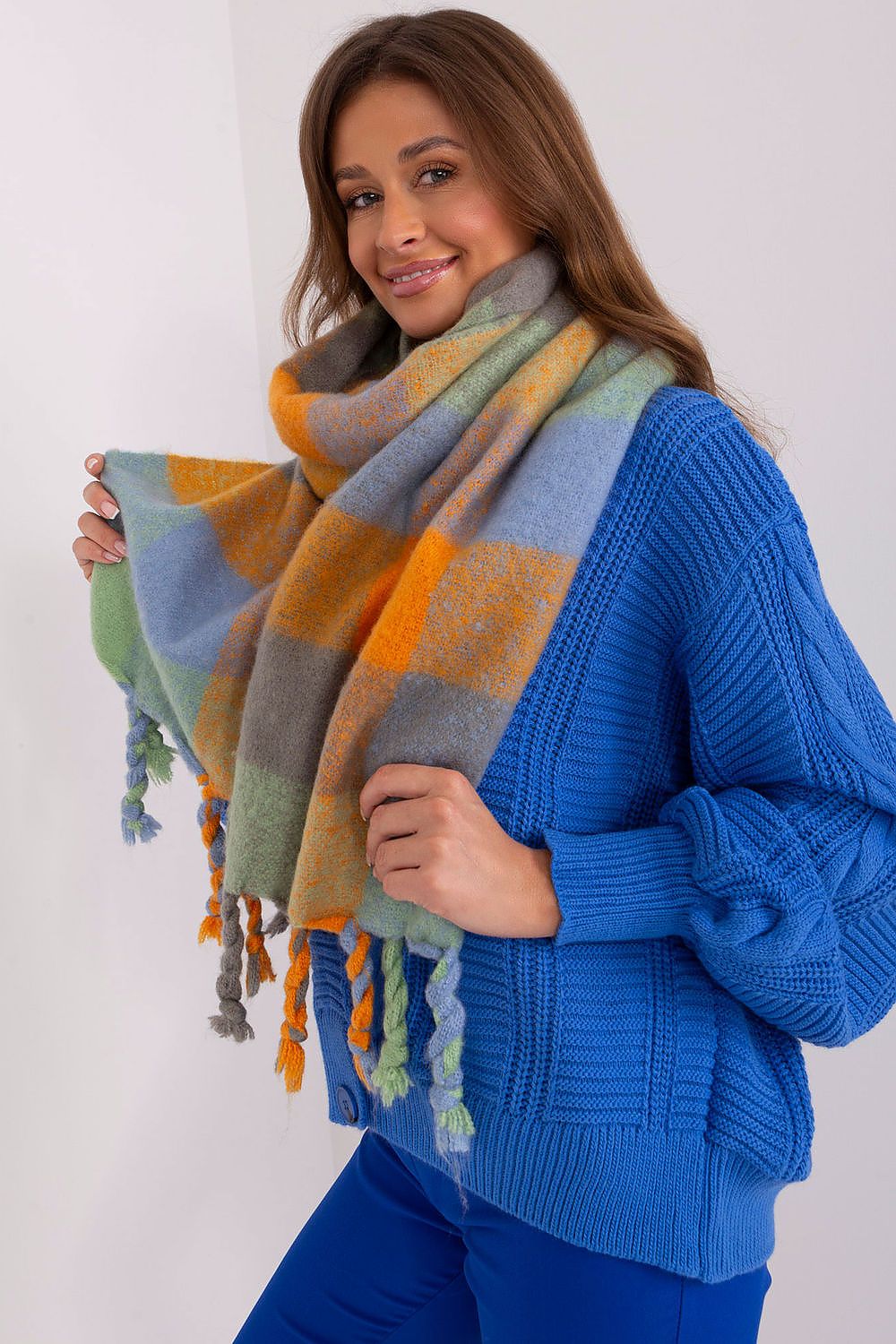 Stylish colourful plaid long scarf with tassels by AT, made from 100% durable polyester, perfect for elegant fall and winter outfits.