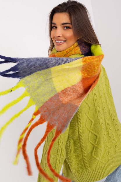 AT Fashionable plaid scarf with tassels, a versatile piece for elevating your winter outfits.