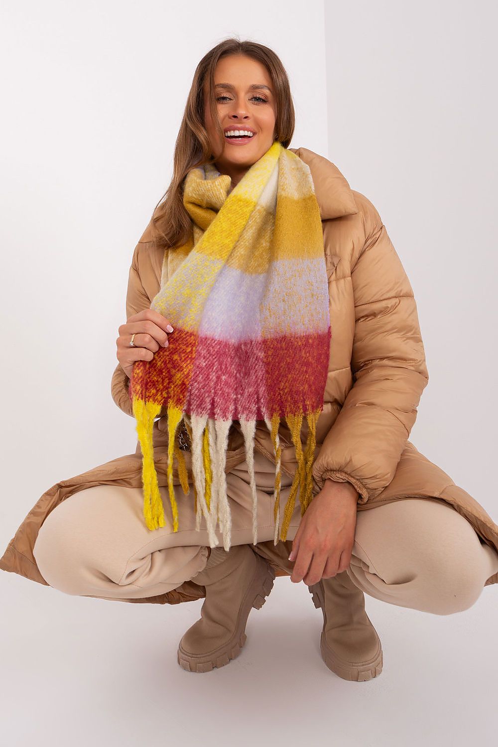 Chic long plaid scarf with elegant tassels, crafted from high-quality polyester by AT, ideal for adding warmth and style.