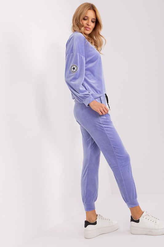 Luxurious women's velour knit sweatshirt and tapered pants set with a stylish round neck, designed by Italy Moda, ideal for everyday elegance.