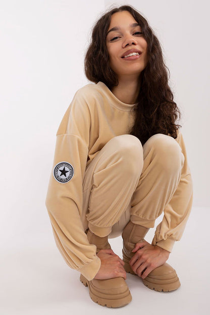 Elegant Velour Knit Sweatshirt by Italy Moda featuring a chic round neckline and signature patch detail, perfect for stylish comfort.