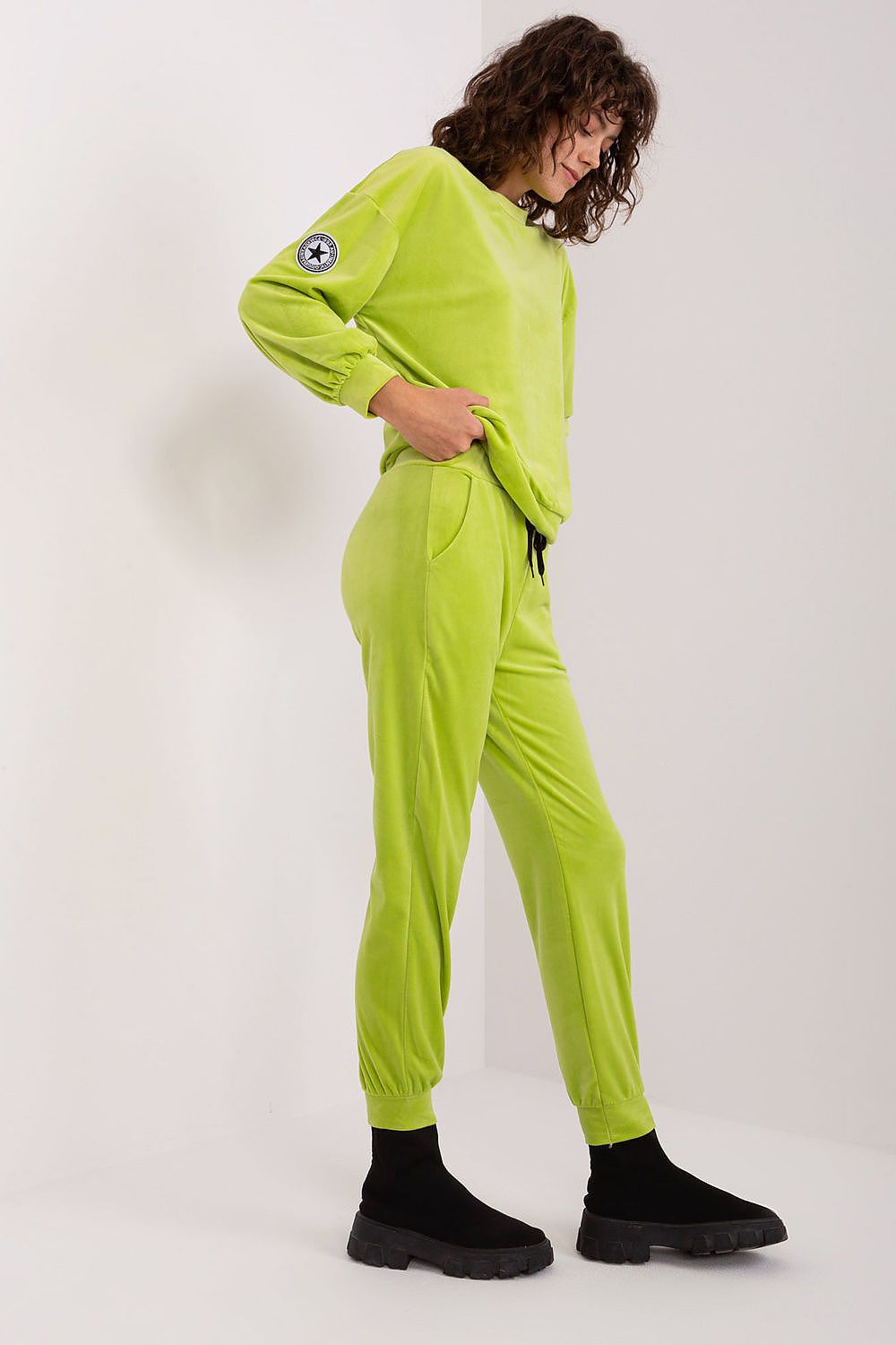 Full view of the Italy Moda Velour Sweatshirt and Pants set, showcasing elegant design and chic style suitable for multiple occasions.