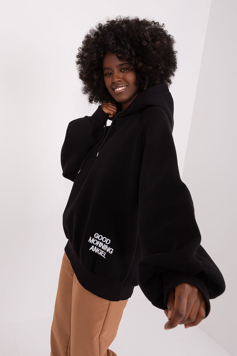 Ex Moda elegant women's sweatshirt hoodie showcasing a decorative front inscription, perfect for casual outings or relaxed everyday wear.