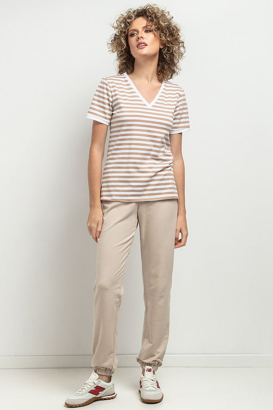 Elegant Slim-Fit V Neckline Blouse by Tessita in OEKO-TEX Certified Cotton Knit, showcasing a refined feminine silhouette with delicate cuffs.