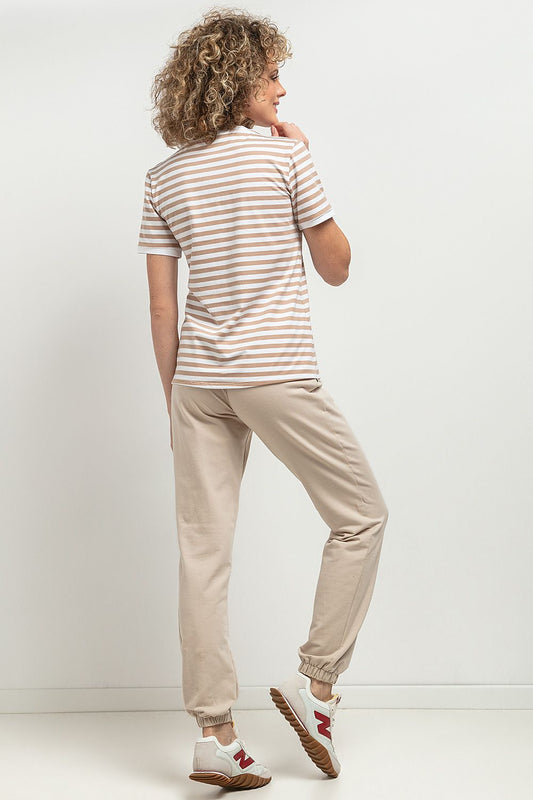 Close-up of Tessita's Slim-Fit V Neckline Blouse, highlighting the decorative pleat and premium quality OEKO-TEX cotton knit fabric.