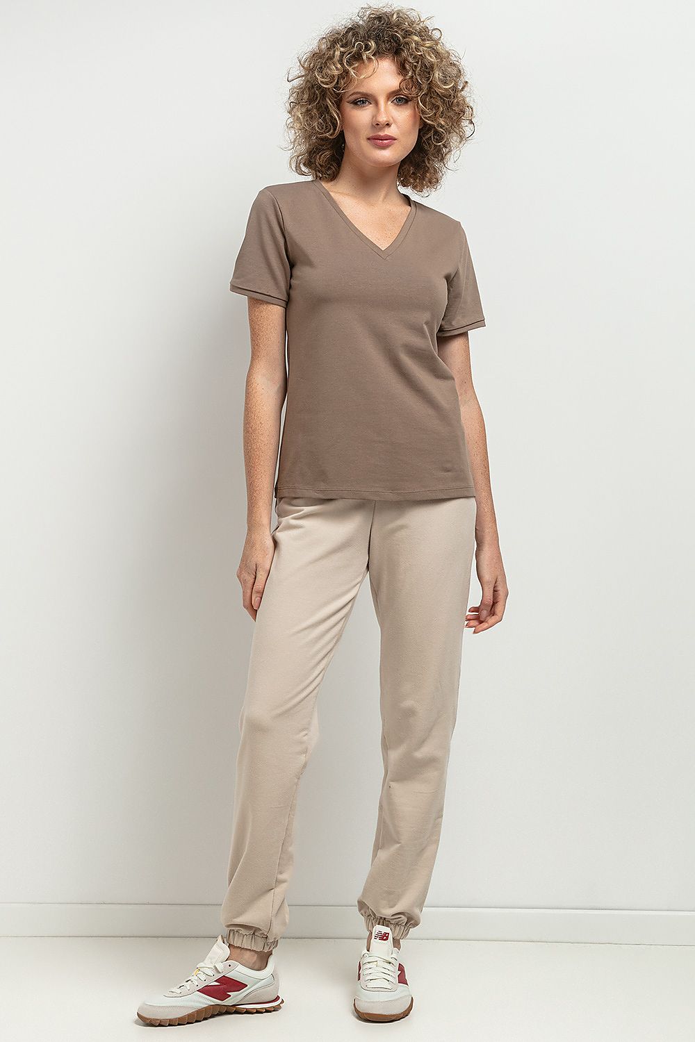 Luxurious striped V neckline blouse by Tessita, made from high-quality OEKO-TEX certified cotton knit, perfect for upscale casual and formal occasions.