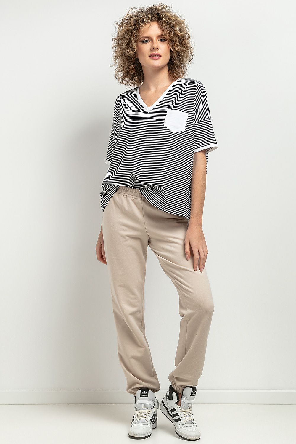 Luxurious strived Tessita Blouse crafted from high-quality knitted fabric, ideal for sophisticated styling.