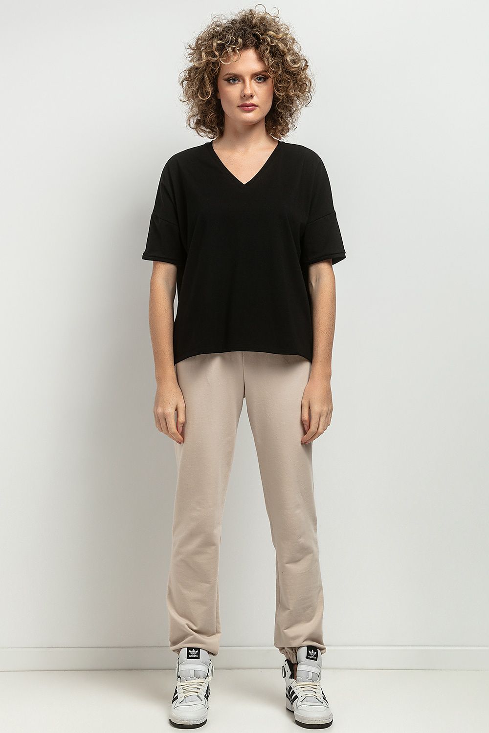 Tessita Luxurious Loose Blouse featuring a delicate V neckline and decorative pleats in an elegant striped design, perfect for sophisticated styling.