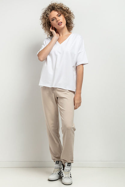 Back view of the luxurious Tessita Loose Blouse, illustrating the exceptional finish and elegant cut, a must-have staple in every wardrobe.