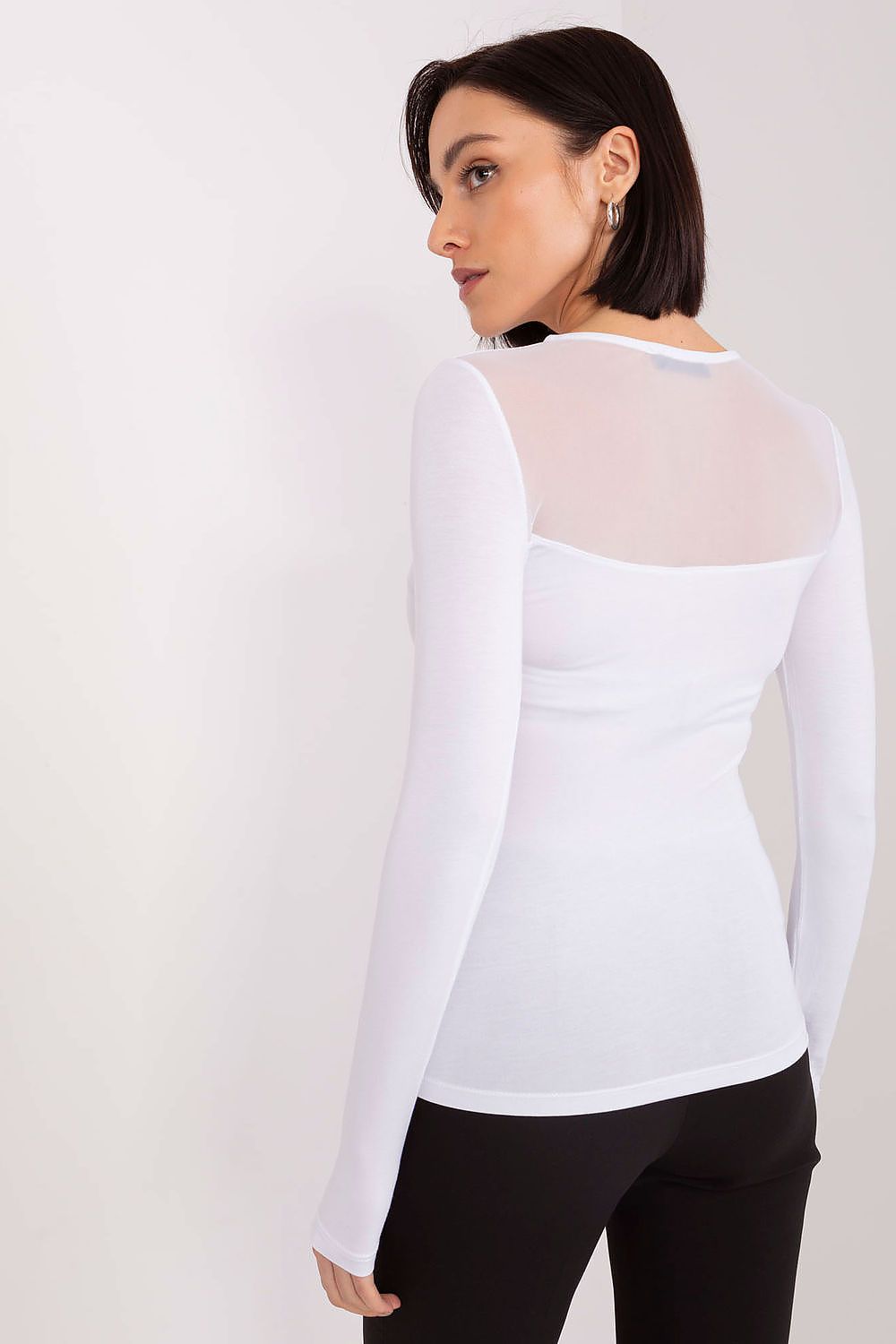 Luxury cotton long sleeve blouse by BFG featuring ribbed fabric and a unique neckline, perfect for elegant comfort.