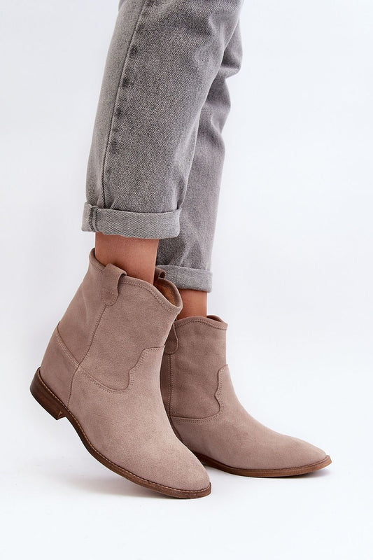 Luxury women's suede boots by Step in Style featuring a tapered fit and flat heel, perfect for elegant styling.