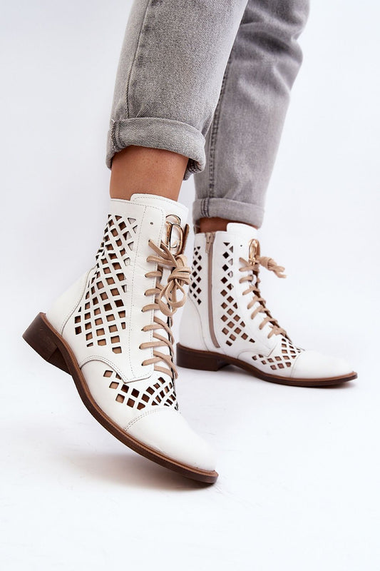 Elegant close-up of Step in style women's natural leather openwork boots, showcasing intricate design details, a secure zipper, and high-quality craftsmanship.