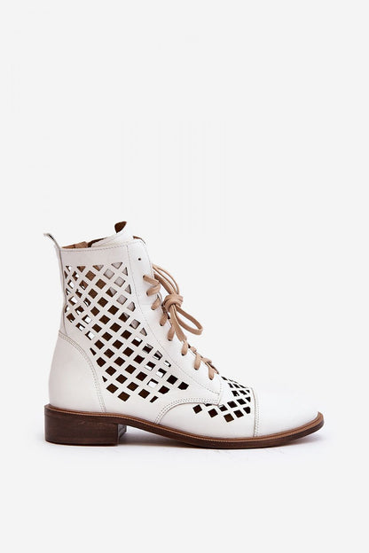 Stylish women's openwork boots by Step in style, constructed from premium natural leather, highlighting the 16 cm upper and flat heel for an elevated yet comfortable look.