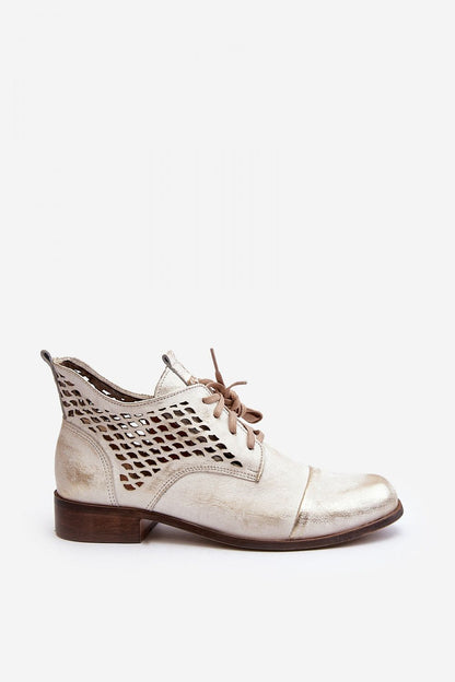 Elegant women's natural leather boots by Step in Style, designed with a rounded toe, zipper, and stylish lacing, embodying luxury and comfort with a low openwork upper.