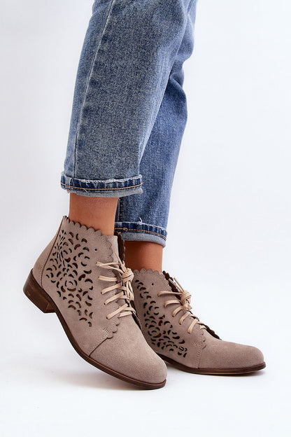 Luxurious women's suede leather ankle boots by Step in Style, featuring a rounded toe cap and stylish zippered design for elegance.